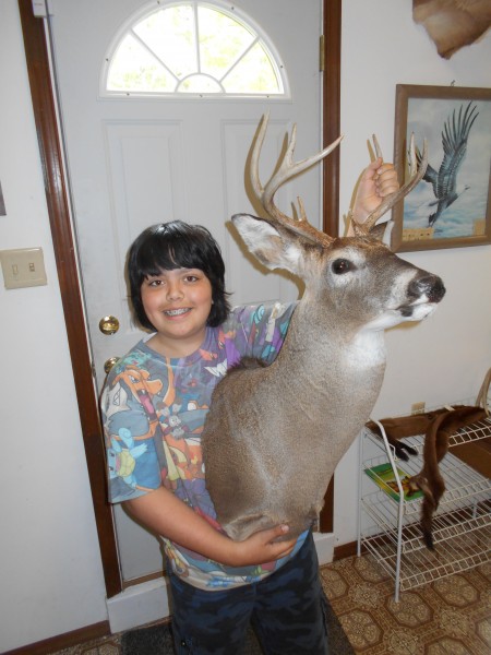 Young Hunters First Whitetail Buck